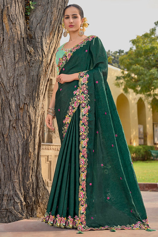 Zariveda : Dark Green and Turquoise Organza Silk Saree with Heavy Thread Embroidery and Sequins Work