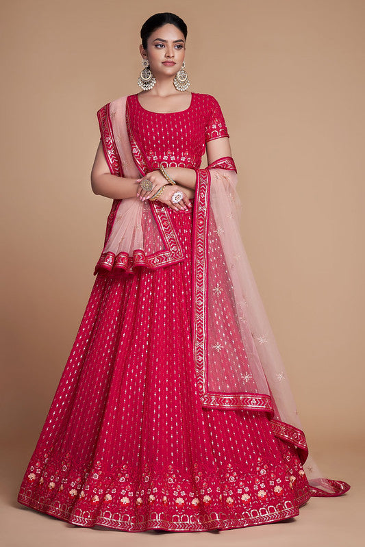 Zariveda: Ravishing Rani Pink Lehenga Choli with Heavy Thread Embroidery & Sequins Work