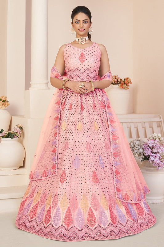 Zariveda: Radiant Pink Net Lehenga Choli with Heavy Thread Embroidery & Sequins Work